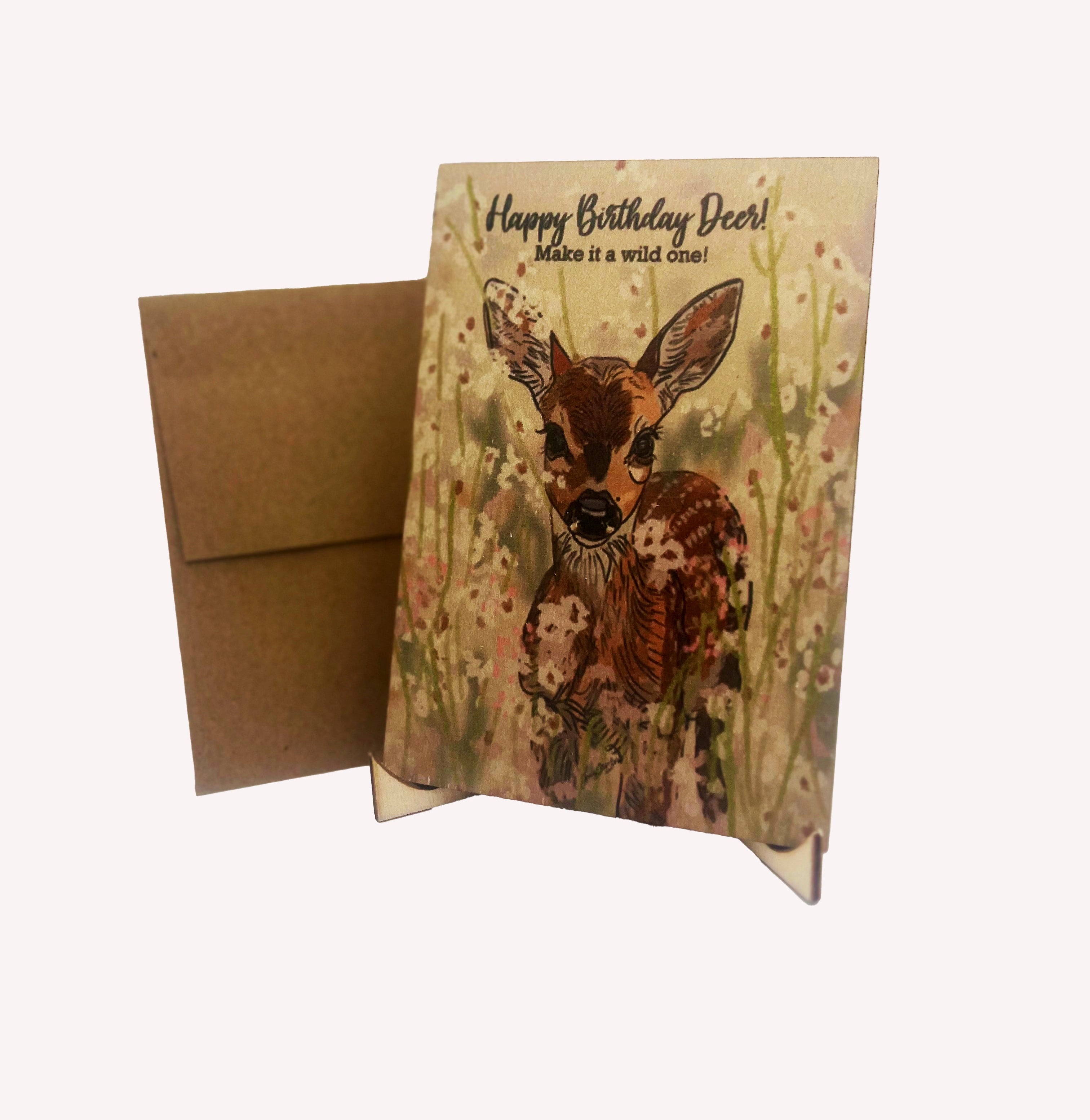 Greeting card with deer illustration and envelope on a white background